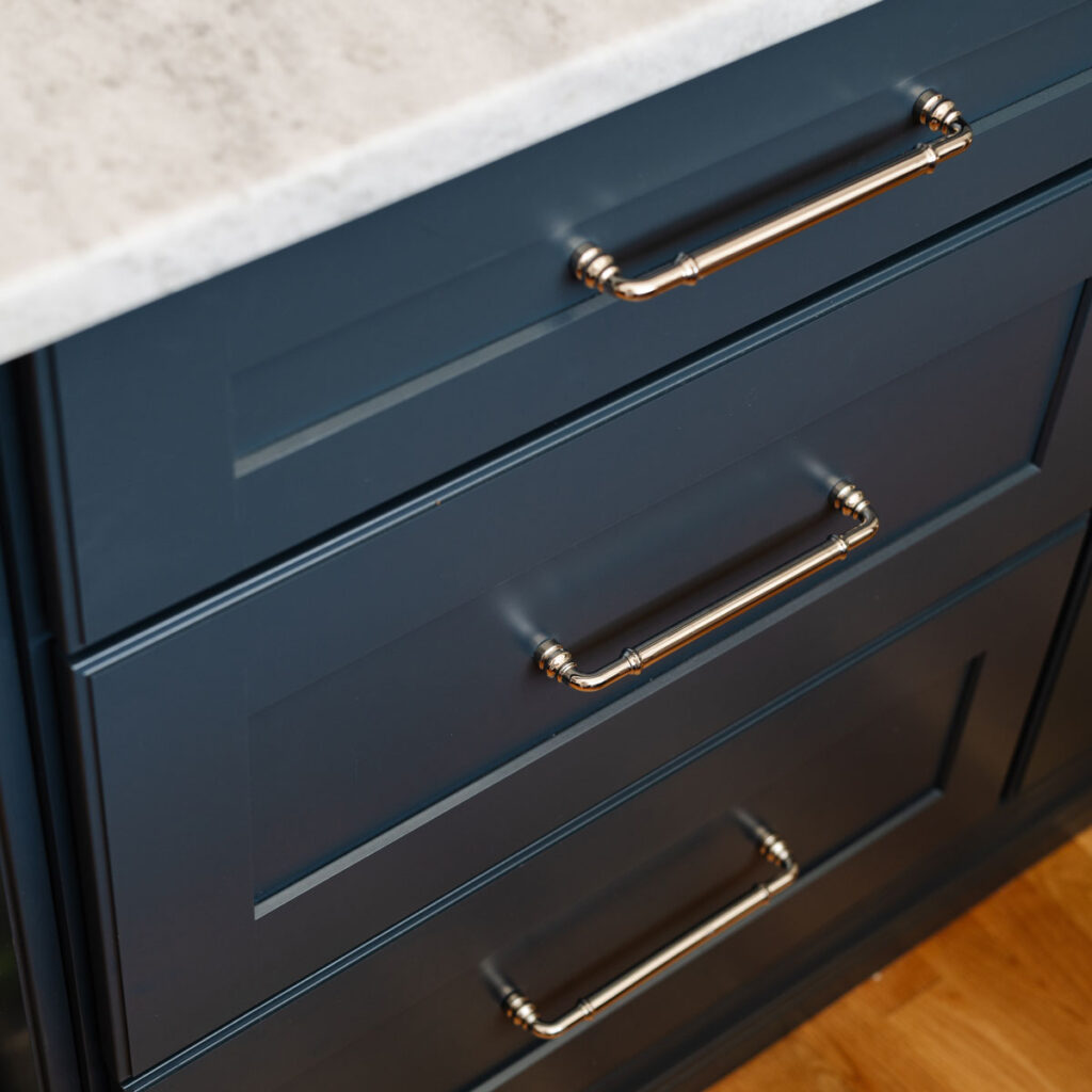 Blue and brushed Nickle cabinet details